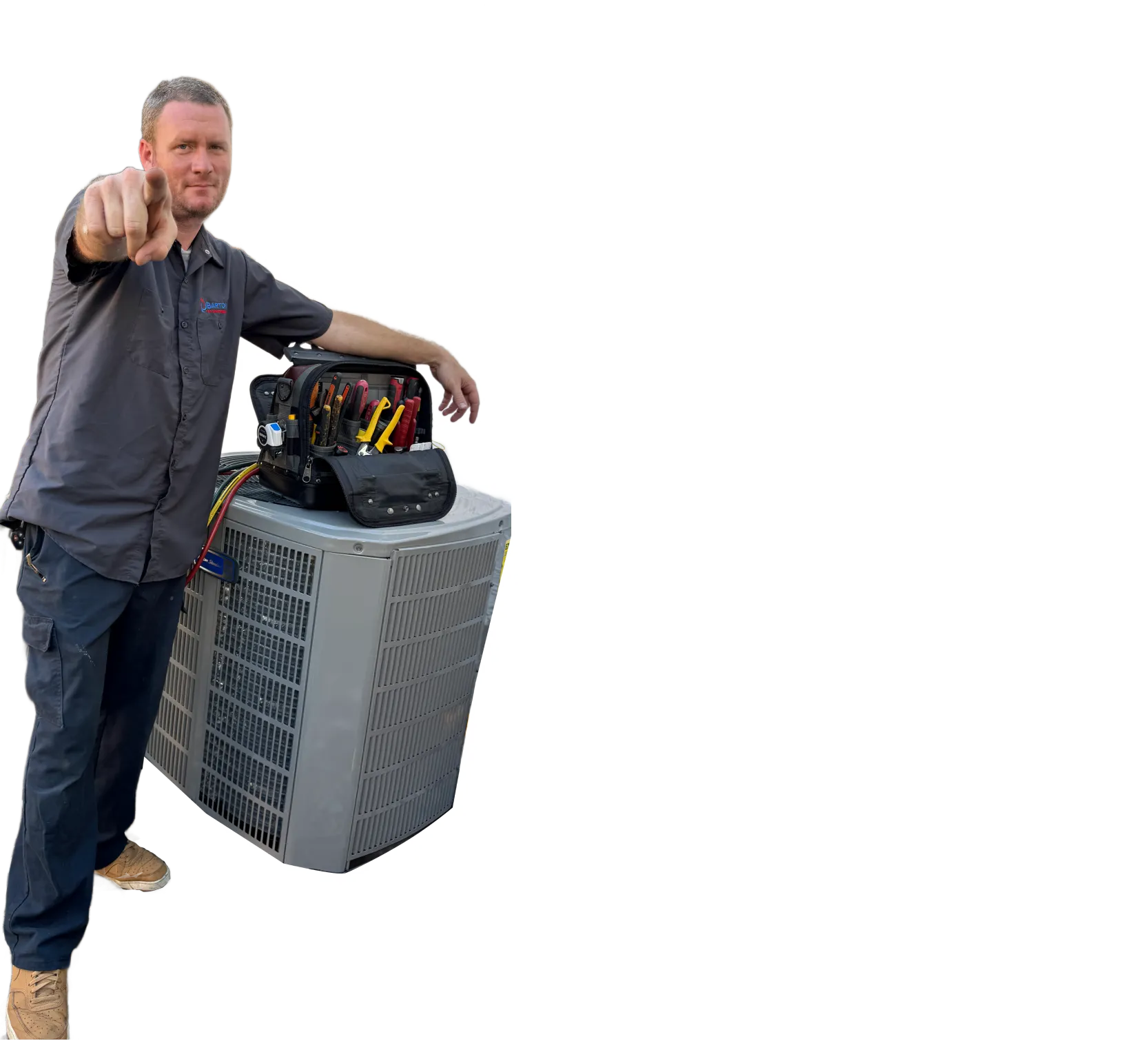 A man standing next to an air conditioner.